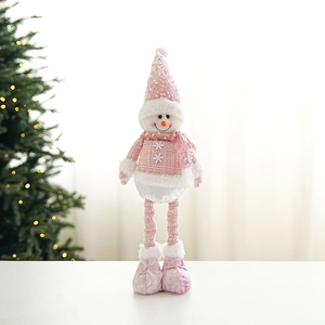 Detail of pink sequined snowman doll with telescopic legs for Christmas decor