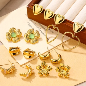 Vintage gold heart and flower earrings with green emerald stone and zircon accents
