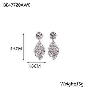 Detail of silver irregular leaf earrings showing dimensions 4.6cm by 1.8cm and 15g weight