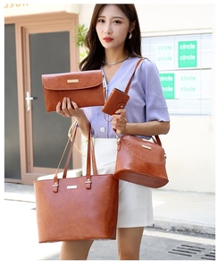 Brown leather four-piece bag set including tote and crossbody bag shown on a model