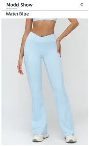 Détail du pantalon de yoga bleu eau avec taille en V croisée et poches latérales