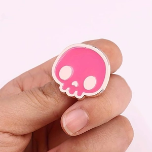 Cute pink skull enamel pin with rose gold metal border for Halloween accessory