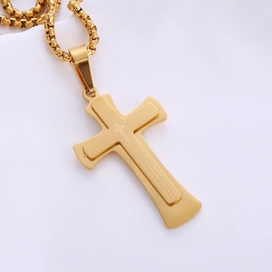 Polished gold and black stainless steel cross pendant necklace with engraved Spanish prayer