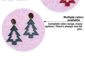 Detailed shot of asymmetrical green glitter Christmas tree earrings with textured metal studs
