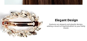 Detail of rose gold hollow leaf spring hair clip with clear vein texture and rhinestones