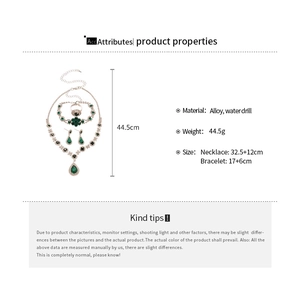Detailed size chart for vintage silver jewelry set with green crystal teardrop pendant