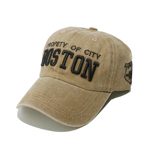 Close-up of khaki washed cotton baseball cap with vintage Boston embroidery details