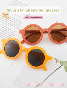 Detail of round matte candy-colored kids sunglasses with UV protection lenses