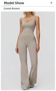 Detailed view of the slim-fit camel brown yoga jumpsuit with flared legs and U-neckline