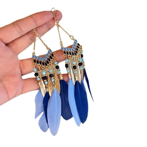 Bohemian blue feather tassel earrings with ethnic beads and gold finish hooks