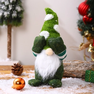 Macro detail of a green forest gnome plush with white beard and festive patterns