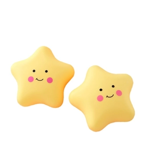 Cute yellow star night light with smiling face and silicone material on white background