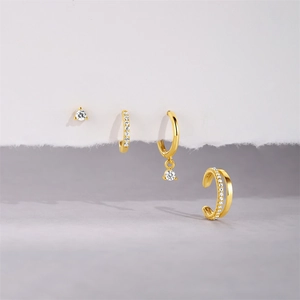 Detailed set of four 18K gold plated S925 silver earrings with sparkling cubic zirconia