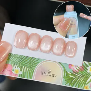 Detailed swatches of N04 warm peach cat-eye gel polish with silver magnetic shimmer