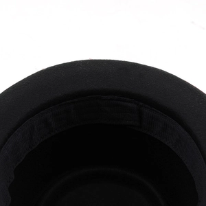 Close-up of internal sweatband and stitching on a black wool felt fedora hat