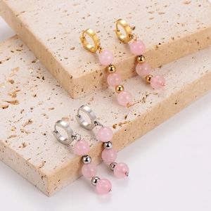 Pink bead stainless steel hoop drop earrings in gold and silver finish on stone
