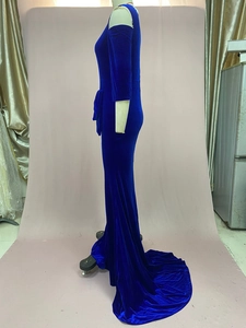 Side view of royal blue velvet evening gown with off-shoulder cut and elegant long train