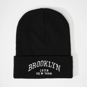 Black Brooklyn 1898 New York embroidered beanie with a classic cuffed knit design