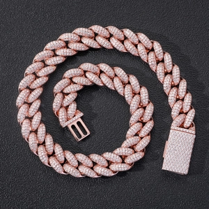 Detail of rose gold Cuban link chain with micro-pave zircons and rectangular clasp