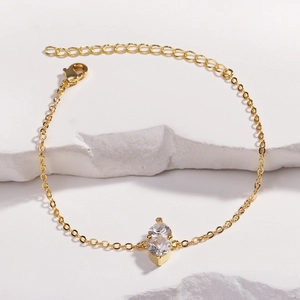 Detail of gold double marquise birthstone bracelet with lobster clasp and extension chain