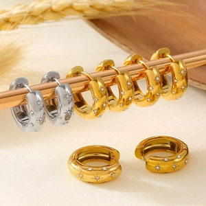 French vintage 18K gold starburst hoop earrings with micro-inlaid zircon detail