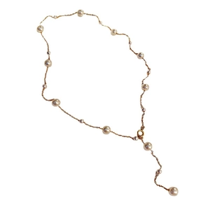 Elegant Y-shaped gold choker necklace with baroque pearls and sparkling crystals