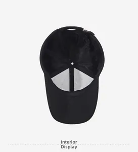 Interior view showing the six-panel structure and stitching of the black baseball cap