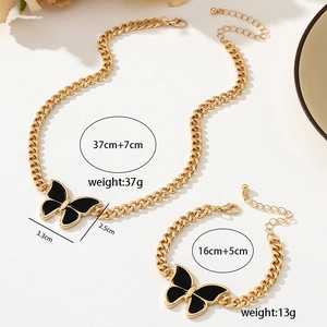 Detail of chunky gold chain necklace and bracelet set with dimensions and weight specs