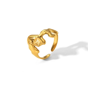 Detailed close-up of golden irregular lava texture on a stainless steel ring surface