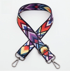 Adjustable wide canvas bag strap with colorful geometric chevron pattern and metal hooks