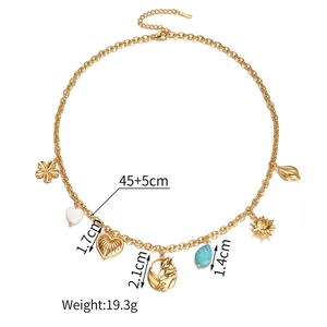 Detailed view of 18K gold stainless steel necklace with dimensions 45+5cm and multi-charms