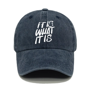 Detail of grey-blue washed cotton baseball cap featuring It Is What It Is printed text