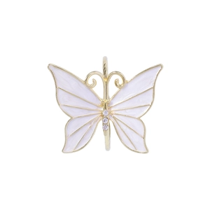 Elegant butterfly napkin ring in golden alloy and white enamel for table settings