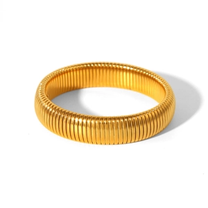 Detailed macro view of vintage 18K gold plated flexible tubogas elastic snake bracelet