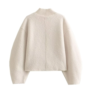 Detailed back view of a beige cropped pullover sweatshirt with a textured boucle finish