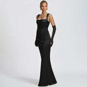 Detail of elegant black satin long dress featuring a slim corset bodice and silky texture