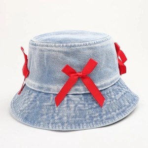 Light blue denim bucket hat for women with three decorative red satin bows on the side