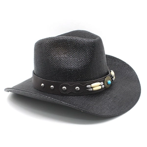 Detail view of woven straw cowboy hat with leather band and turquoise stone embellishment