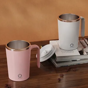 Pink and white automatic magnetic self-stirring coffee mug with stainless steel interior