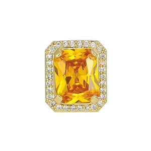 Elegant gold ring with emerald-cut yellow gemstone and zircon halo on white background