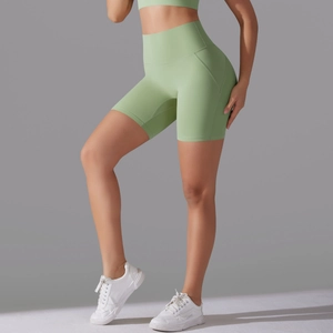 High-waist light green seamless yoga shorts for women in a sleek athletic slim fit
