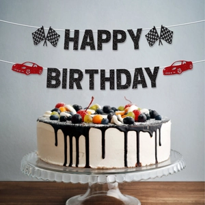 Racing car happy birthday banner with black glitter letters and red racing cars