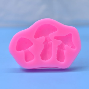Moule en silicone rose avec trois champignons pour décoration de gâteaux et résine