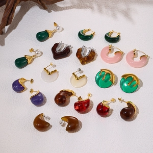 Colorful resin hoop and teardrop earrings in vibrant candy tones with gold metal details