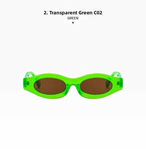 Close-up of narrow oval sunglasses in transparent green frame with dark lenses