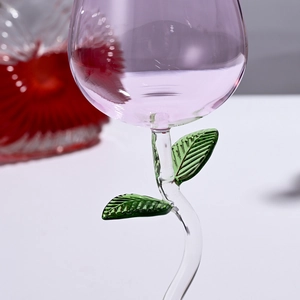 Romantic rose shaped pink wine glass with green stem made of high borosilicate glass