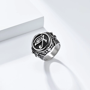 Macro shot of vintage steel Egyptian Eye of Horus ring with oxidised relief details