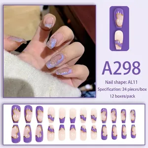 Long coffin press-on nails with purple and cream grid pattern and gold wave accents
