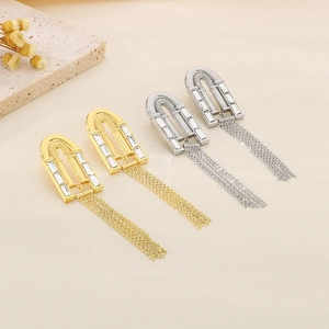 Boucles d'oreilles longues à pampilles en or 18k et argent avec des zircons
