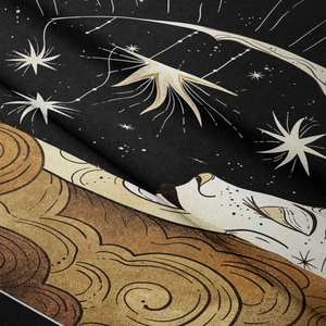 Close-up of astrological tapestry showing celestial stars and moon on canvas fabric